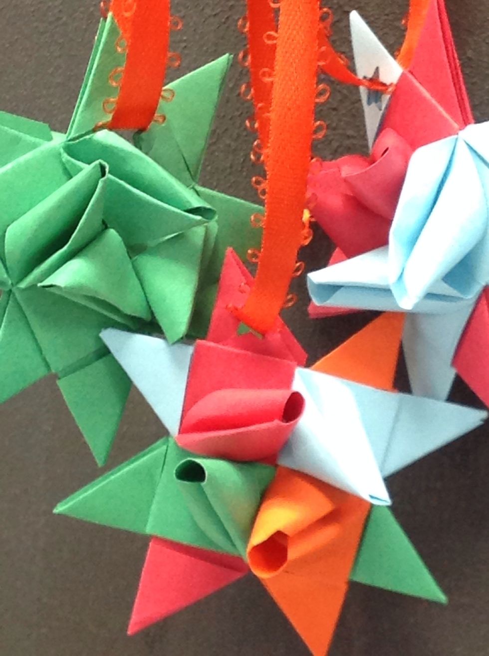 This is a great project for young and old. It's just 4 strips of paper. No glue, no mess. But glitter would look really nice on them!