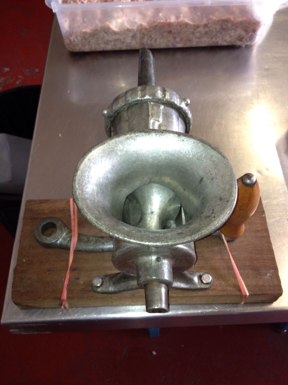 This is a hand sausage stuffer, very cool! Place in freezer the day before so it is super cold. This helps the fat from melting.