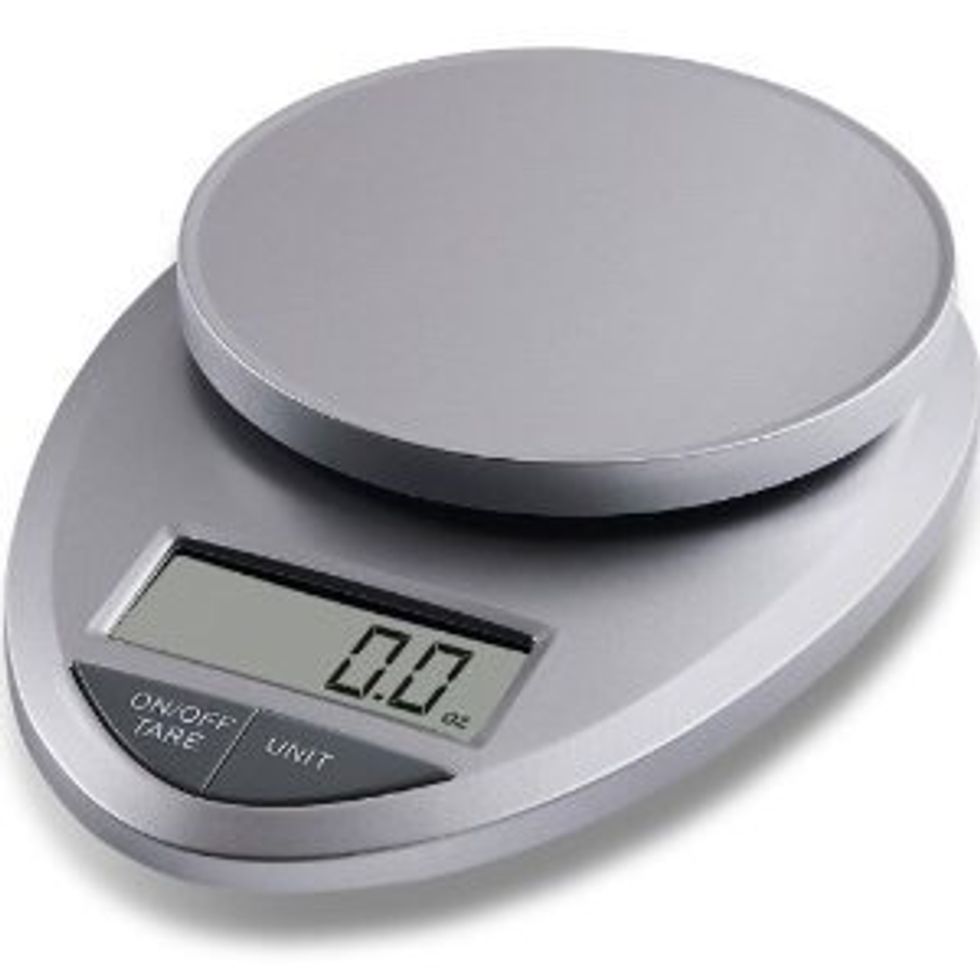 This is a kitchen scale it is used to weigh foods I can use it to weigh foods when I'm cooking