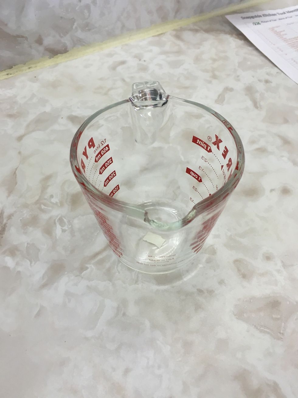 This is a liquid measuring cup and it is used to measure large amounts of liquid