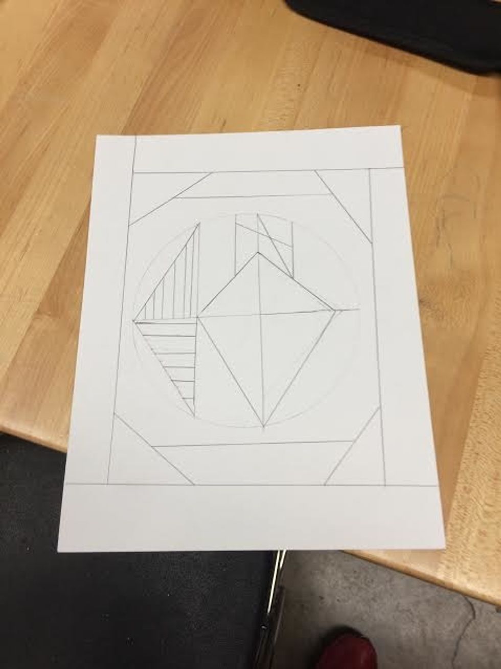 This is a little farther than what was described so far, but if you look inside of the circle I started adding lines inside the shapes and outside of the shapes inside the circle.