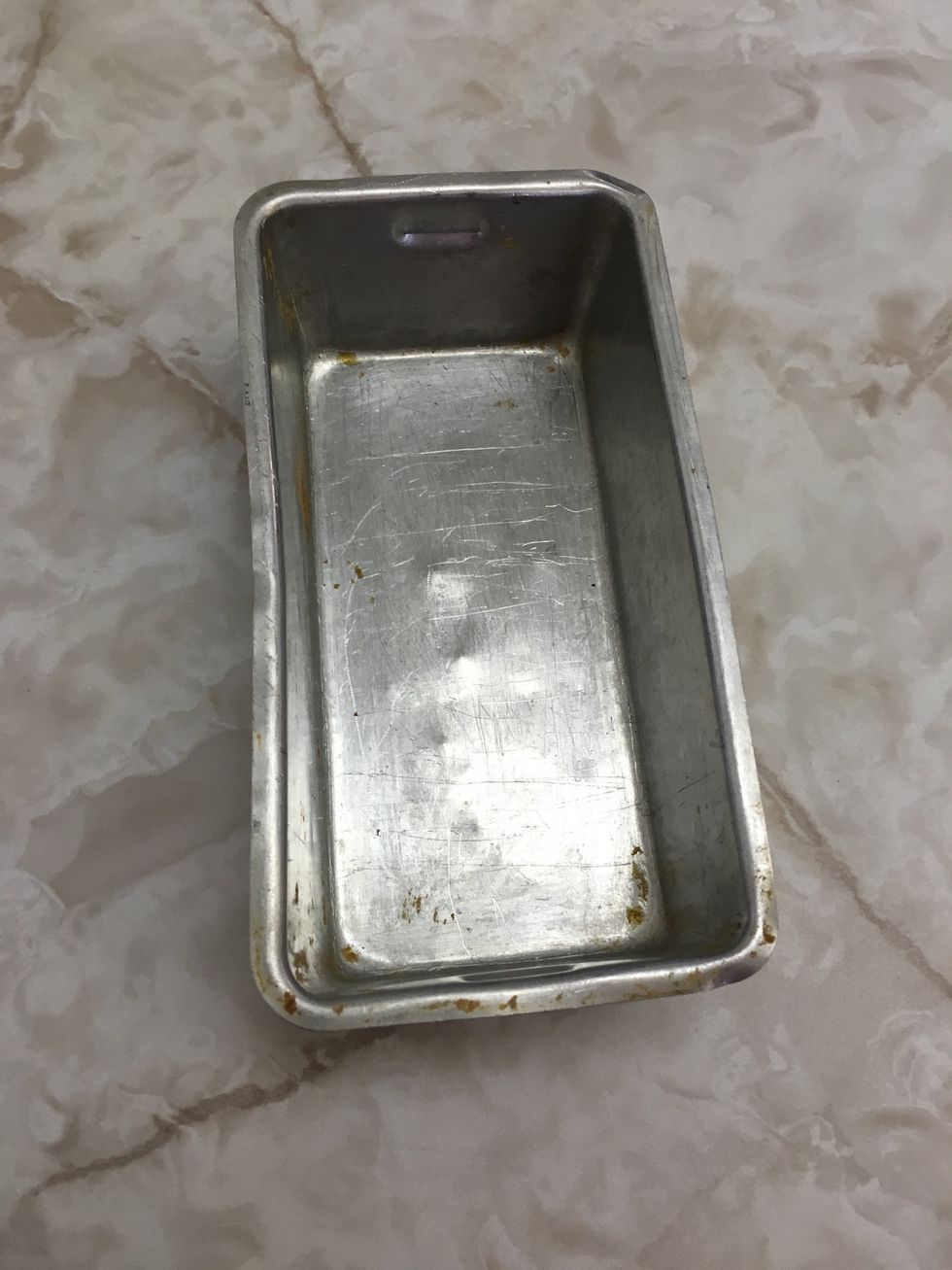 This is a loaf pan it is used to bake banana bread or zucchini bread