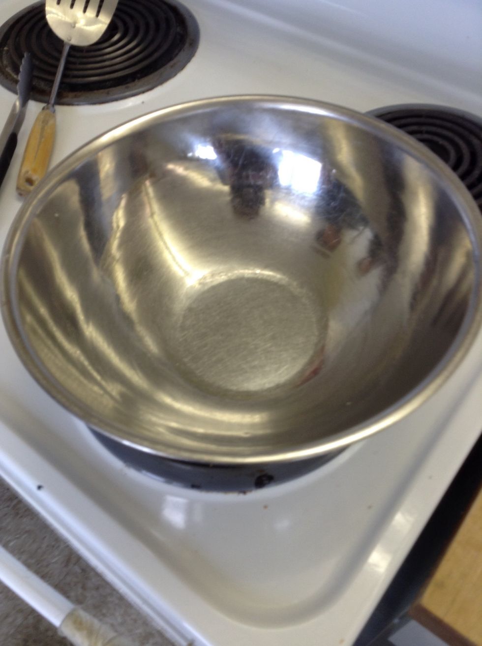 This is a metal mixing bowl. This is used to put ingredients in when you are mixing them. I can use a metal mixing bowl to put the ingredients in when making something.