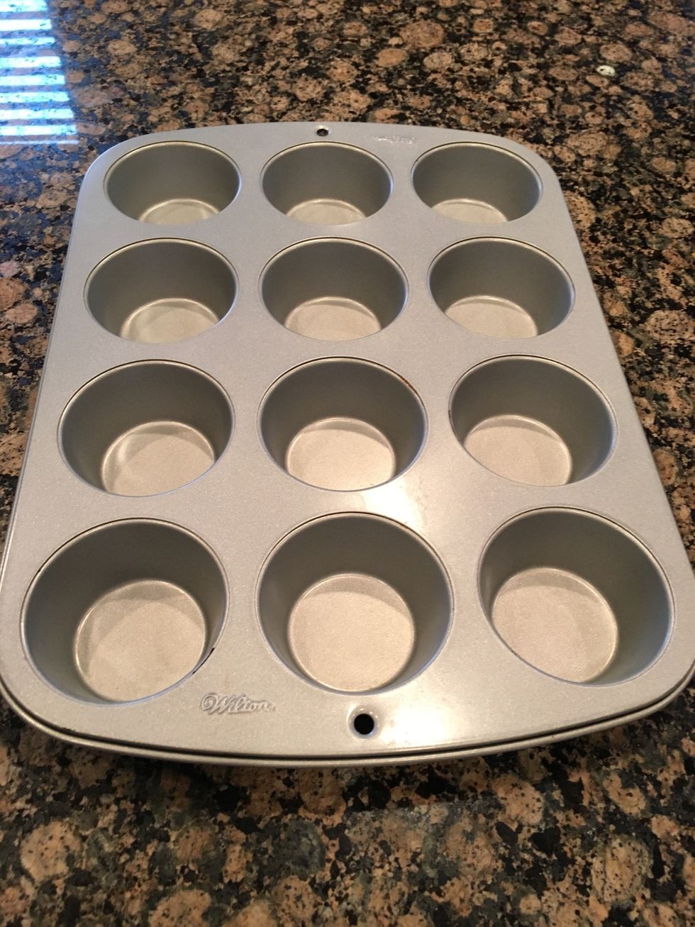 This is a Muffin tin it is used to mold muffins or cupcakes