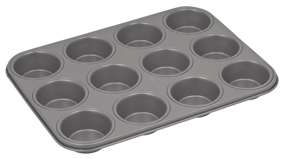 This is a muffin tin used for making muffins or cupcakes I can use it to bake cupcakes