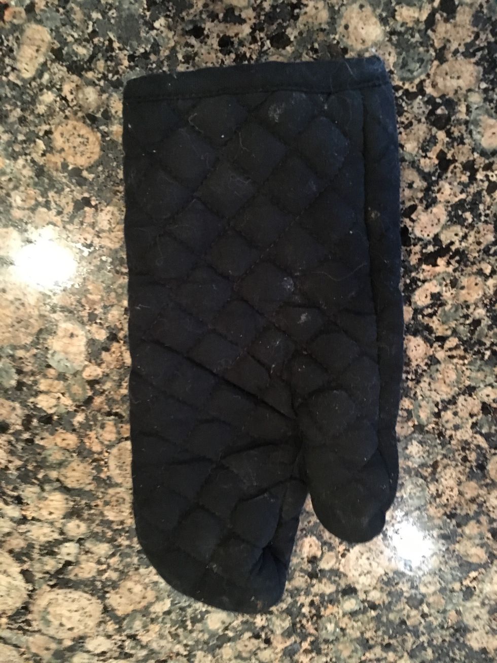 This is a oven mitt is used to protect your hands from burning yourself when you're taking something out of the oven