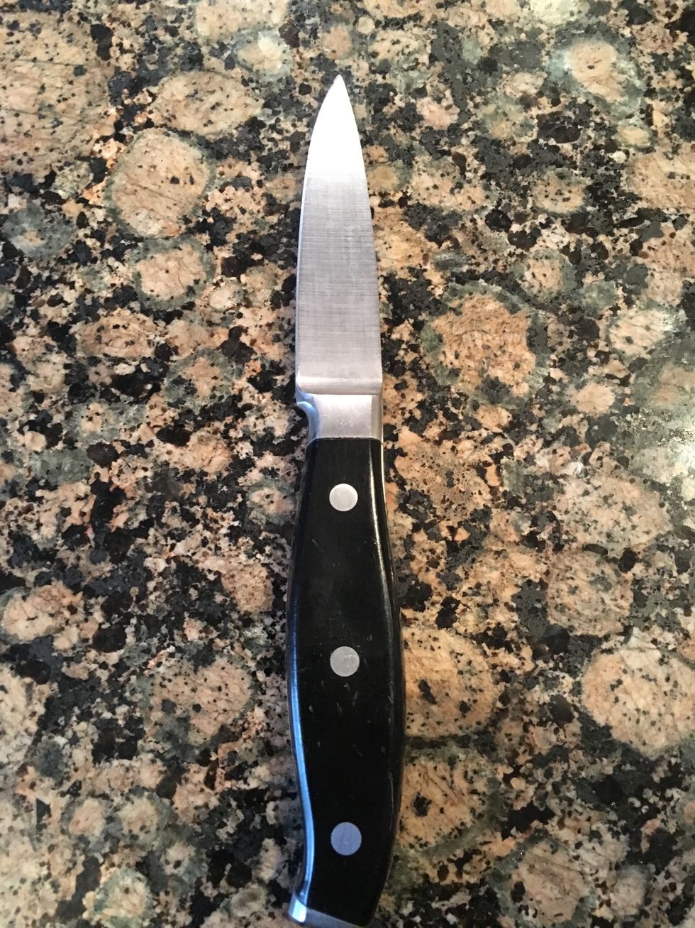 This is a paring knife it is used to cut delicate fruits or vegetables