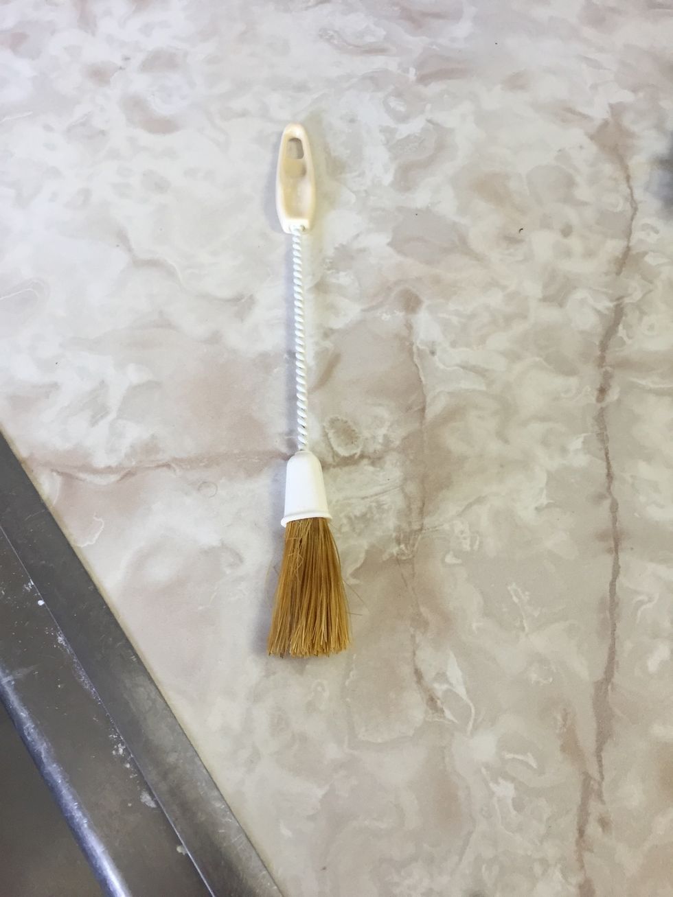 This is a pastry brush it's used for spreading butter, oil or glaze on food I can use a pastry brush to butter foods