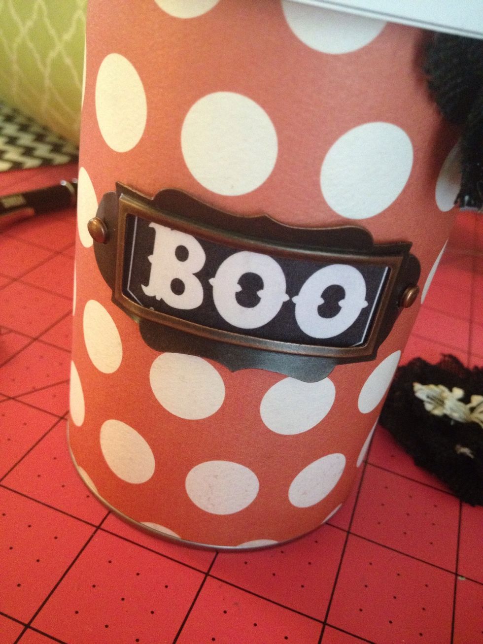 This is a Petaloo Vintage Label Plate- I just lined it up- used my Xacto to poke the brad holes- then added the Authentique BOO sticker behind. Buying a collection kits gives you many options