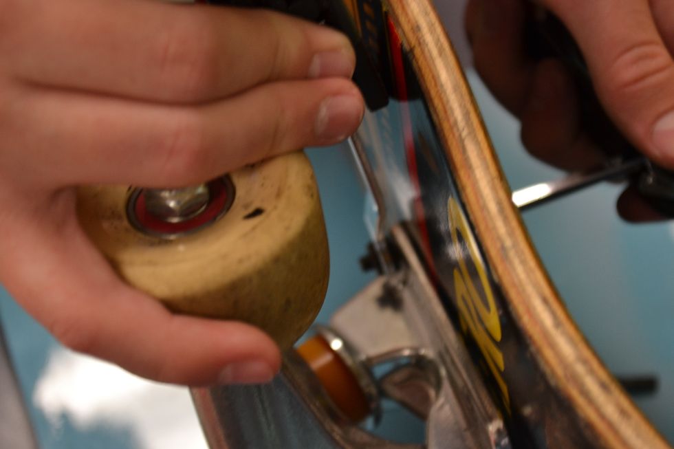 This is a photo during the installing of the trucks.