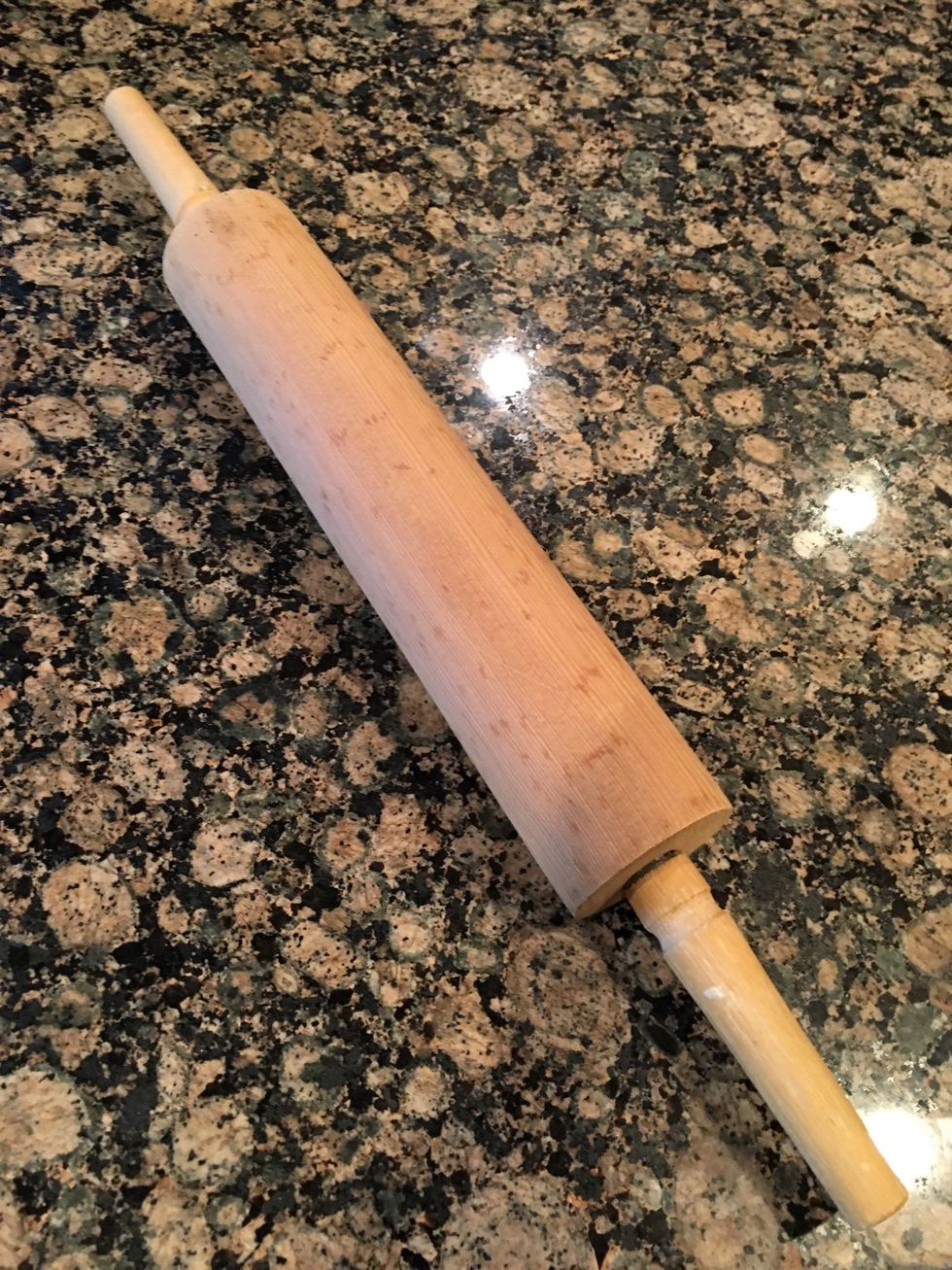 This is a rolling pin it is used to flatten dough