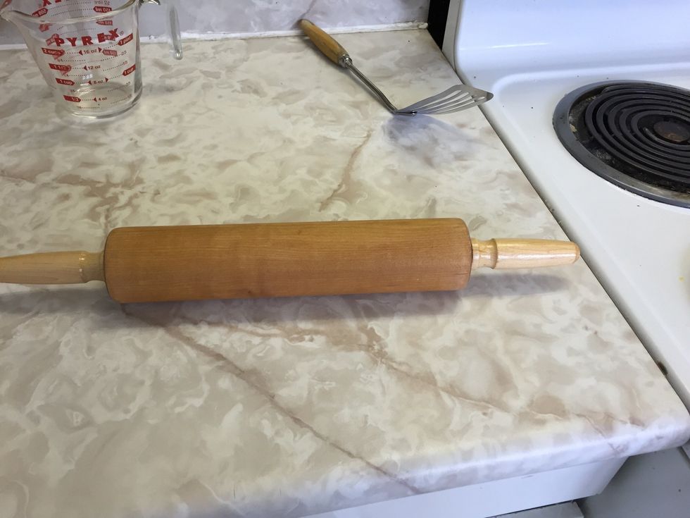 This is a rolling pin. Its use is flattening out food. I can use it when I need to flatten dough for a recipe.