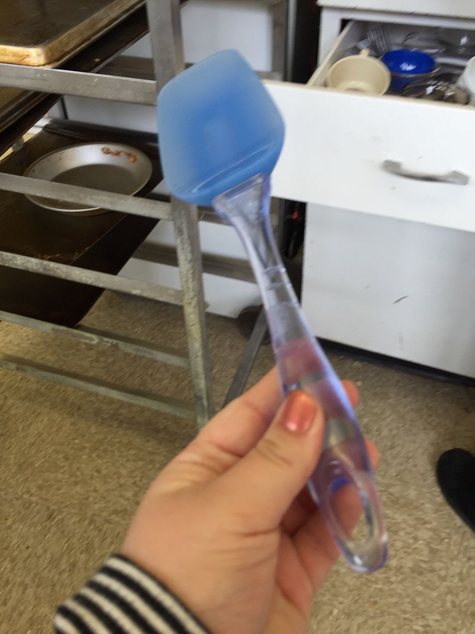 This is a rubber scraper it is used for scraping dough and other materials out of mixing bowls. I can scrape dough out of a bowl.