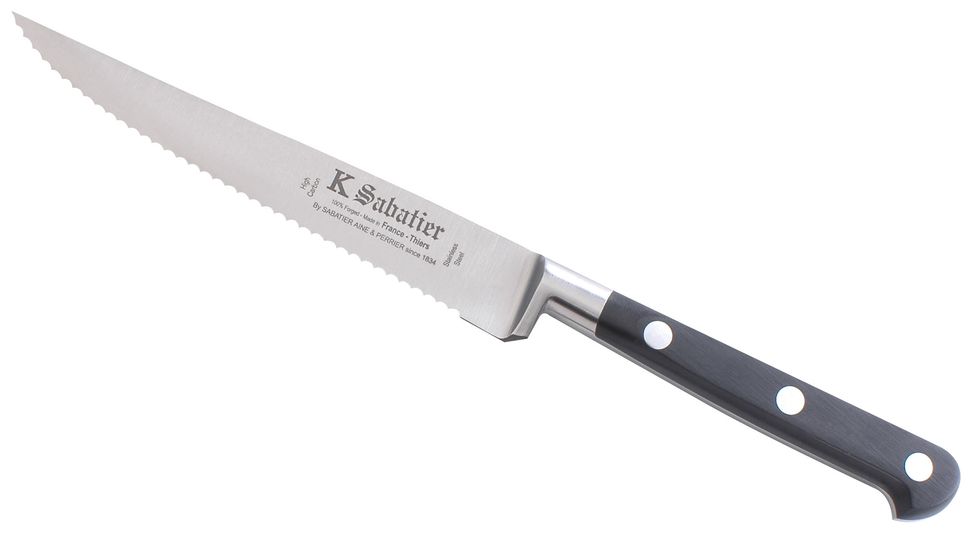 This is a serrated knife it is used for cutting it has serrations in it that help bite into the surface of the item being cut I can use a serrated knife when I am cutting tough food