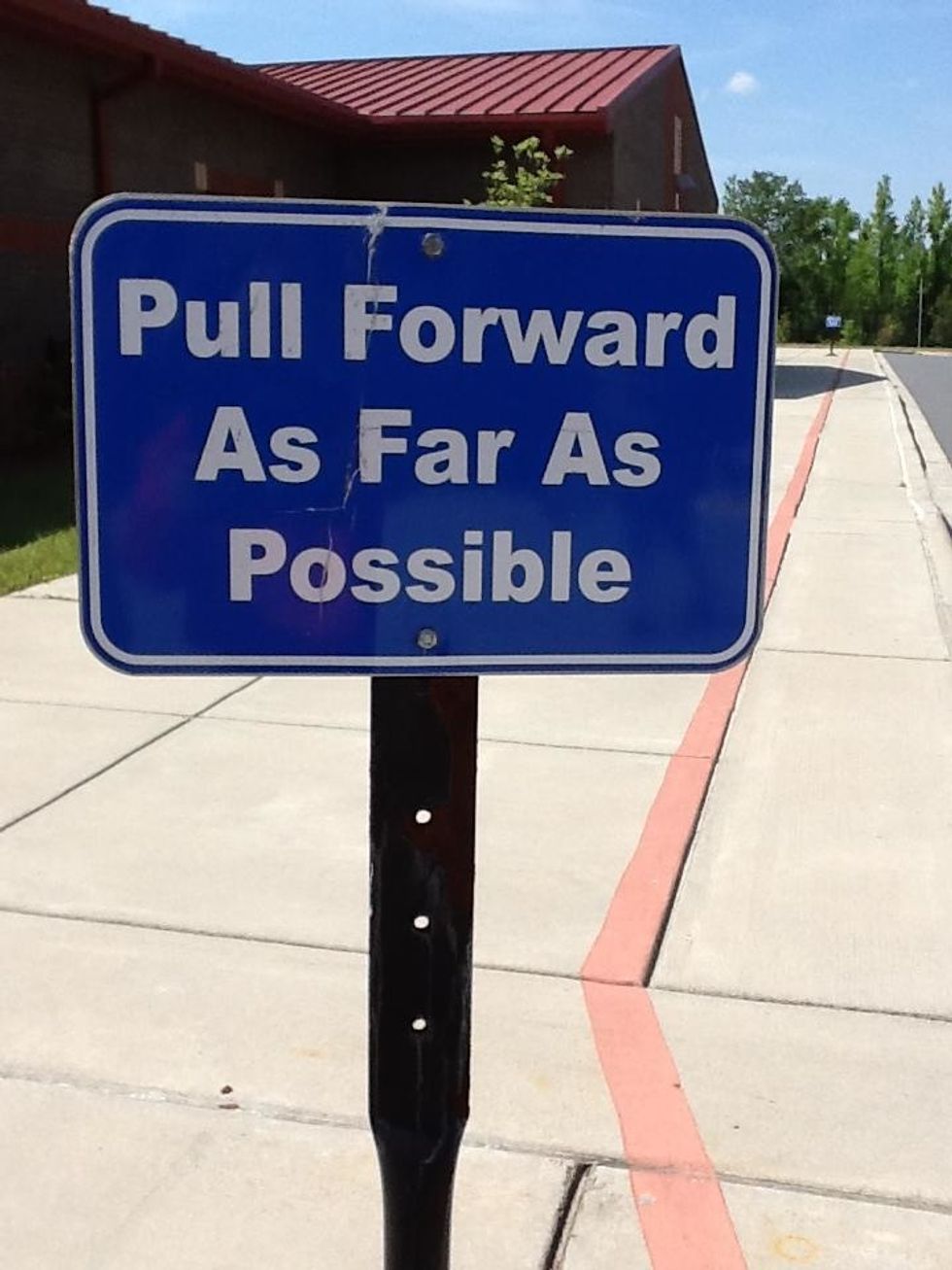 This is a sign for the car rider line which represents symmetry.