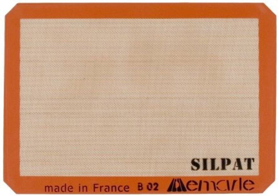 This is a silpat it is used for having a non stick baking sheet I can use it when I make cookies