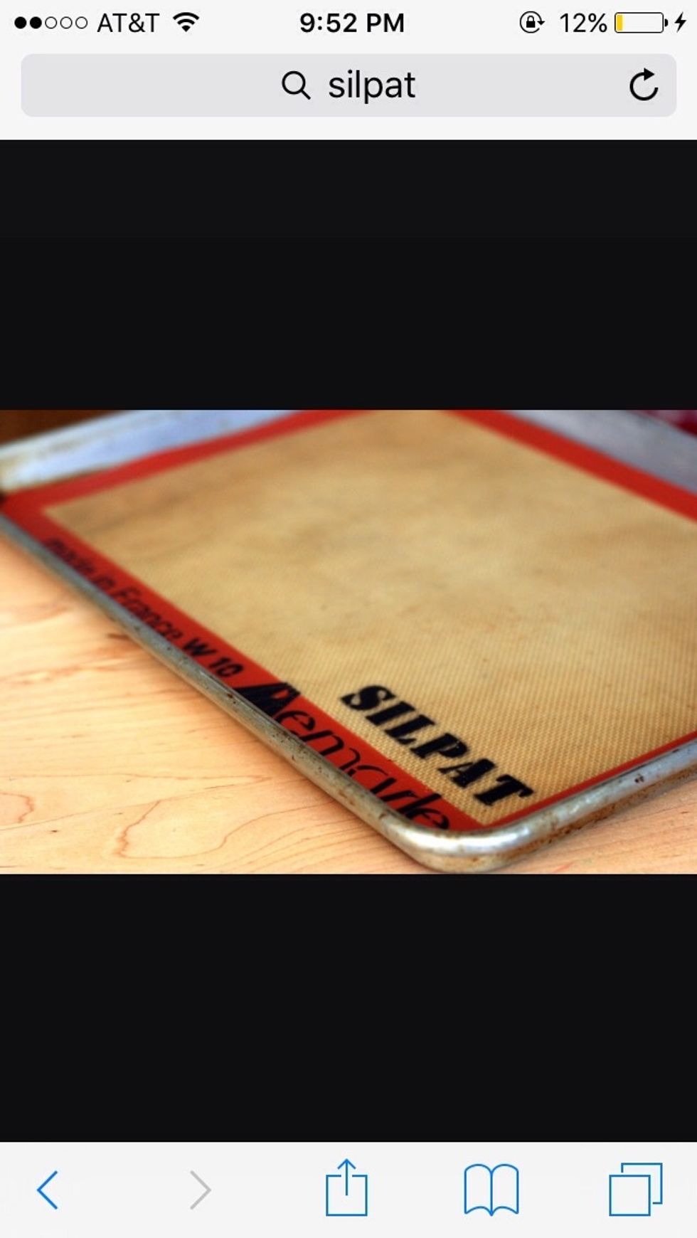 This is a silpat. Its use is to provide a non-stick surface. I can use this so cookies won't stick on a pan or sheet.