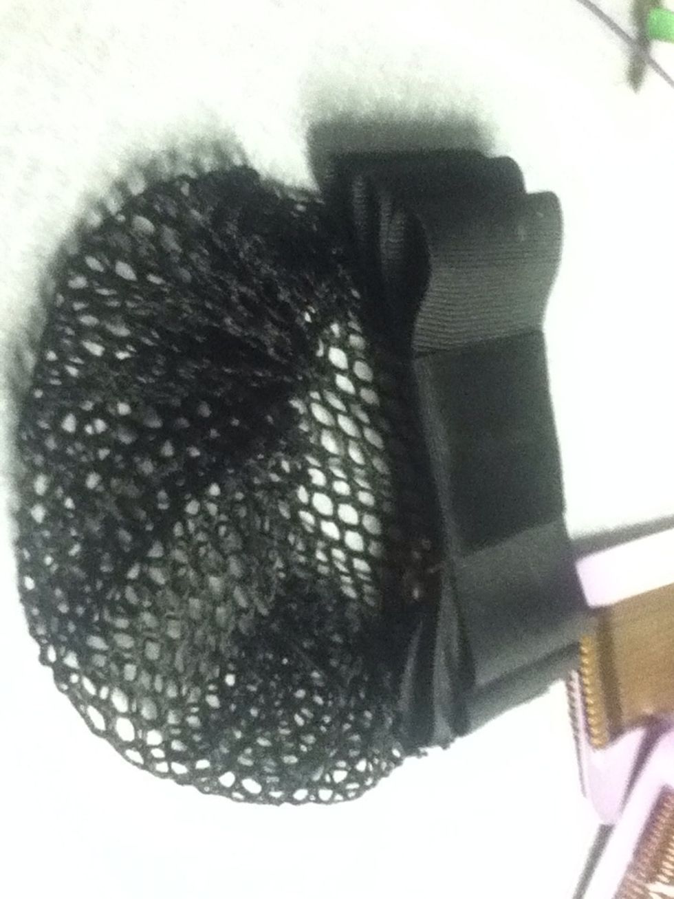 This is a simpler hair net, I braid my hair and them put it in, but you basically could just put if in a bun and go.