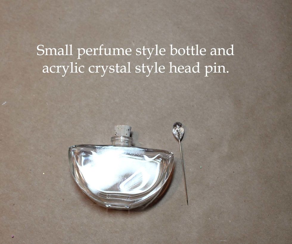 This is a small perfume style bottle that came from eBay. I got the headpins from Scrapbook.