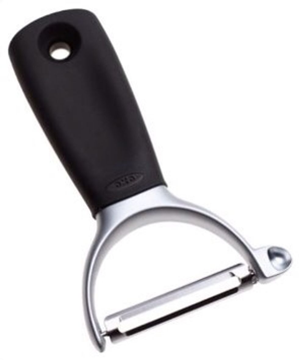 This is a vegetable peeler. It is used to peel the skin off the vegetable. I can use a vegetable peeler to peel the skin off a cucumber.