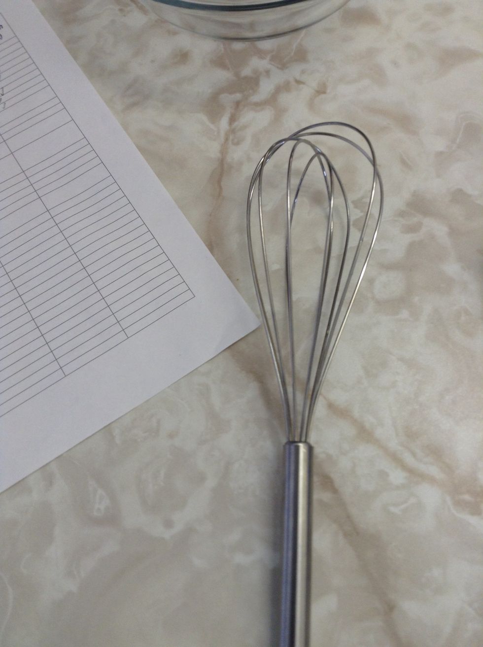 This is a whisk. A whisk is used to mix batter or combine ingredients. I can use a whisk to scramble my eggs.