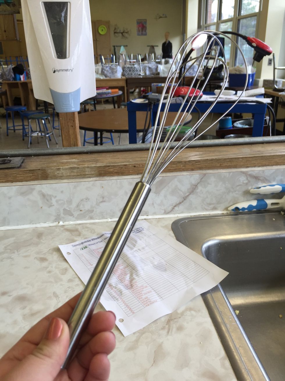 This is a whisk it is used to whisk liquids and dry foods together. I can whisk foods and liquids together.