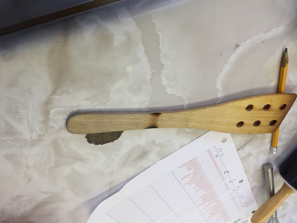 This is a wooden spatula it can be used to scrape ingredients of the mixer bowl. I can use a wooden spatula.