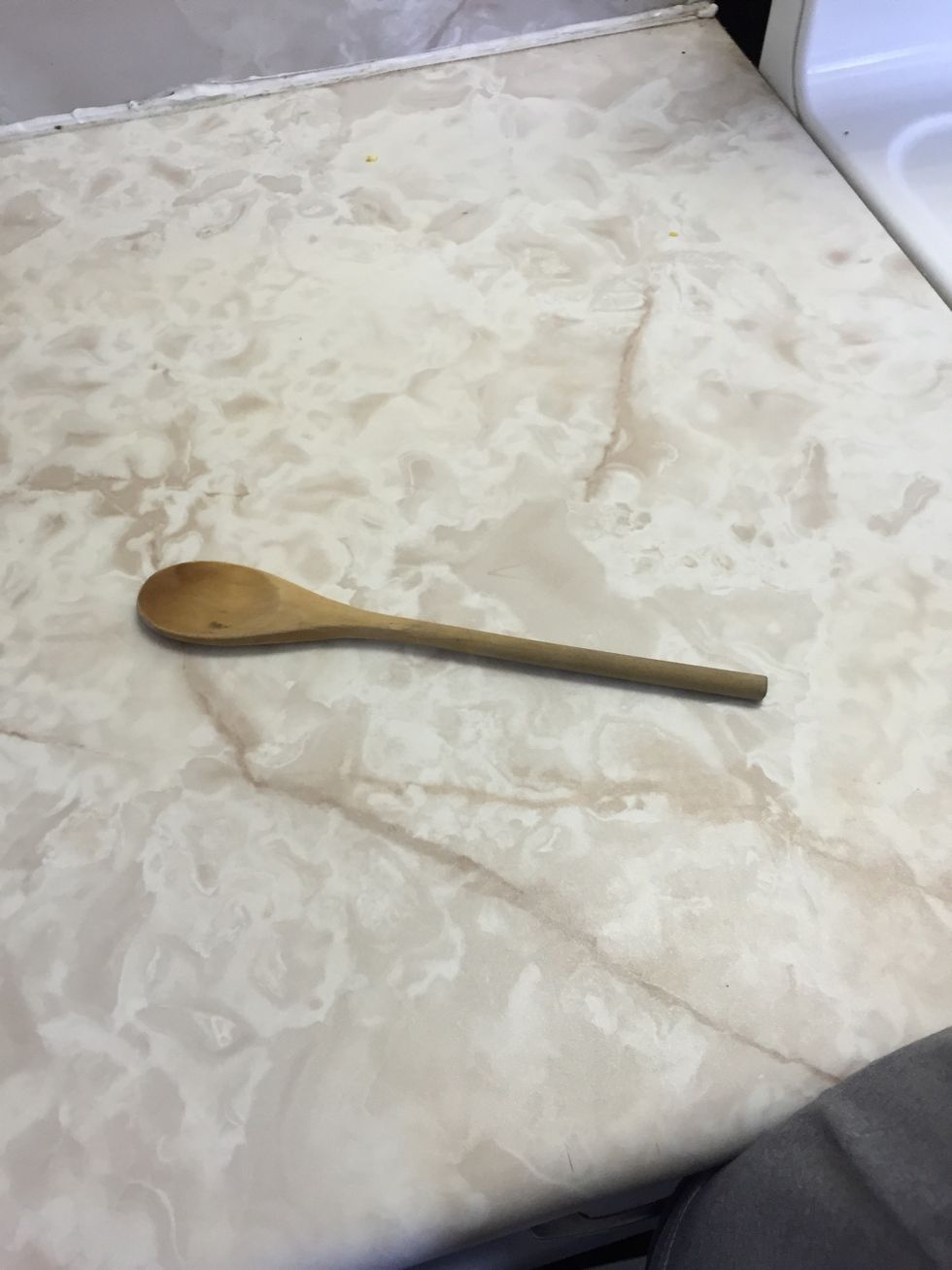 This is a wooden spoon. You use this tool to mix ingredients. I can use wooden spoons when I am mixing ingredients.
