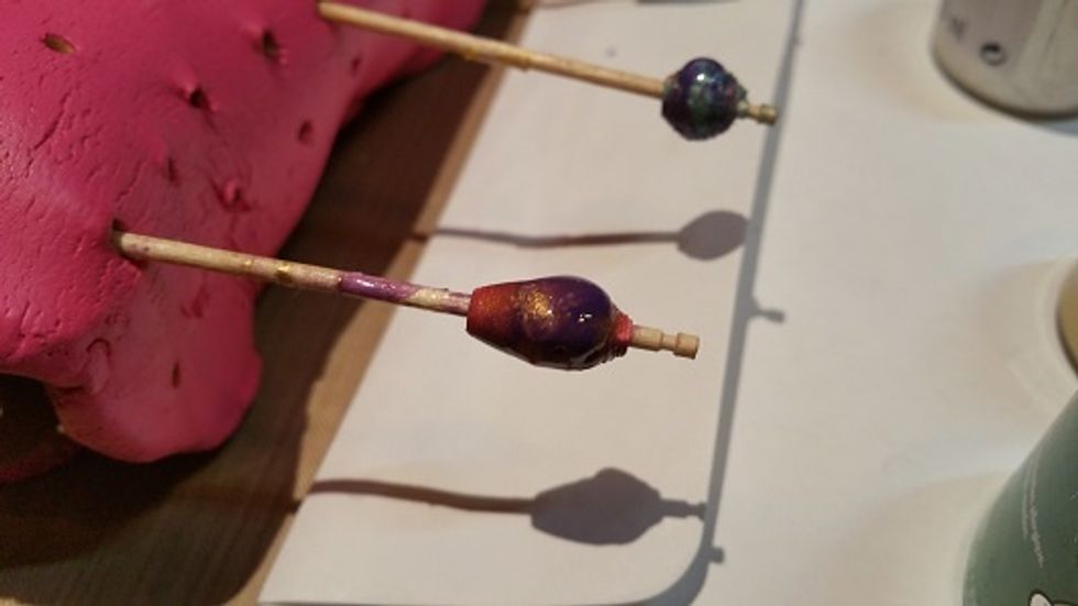 This is an example of pooling or beading. Notice the bead is on the top. I have rotated the bead from the bottom to the top and it will gradually disperse with gravity.