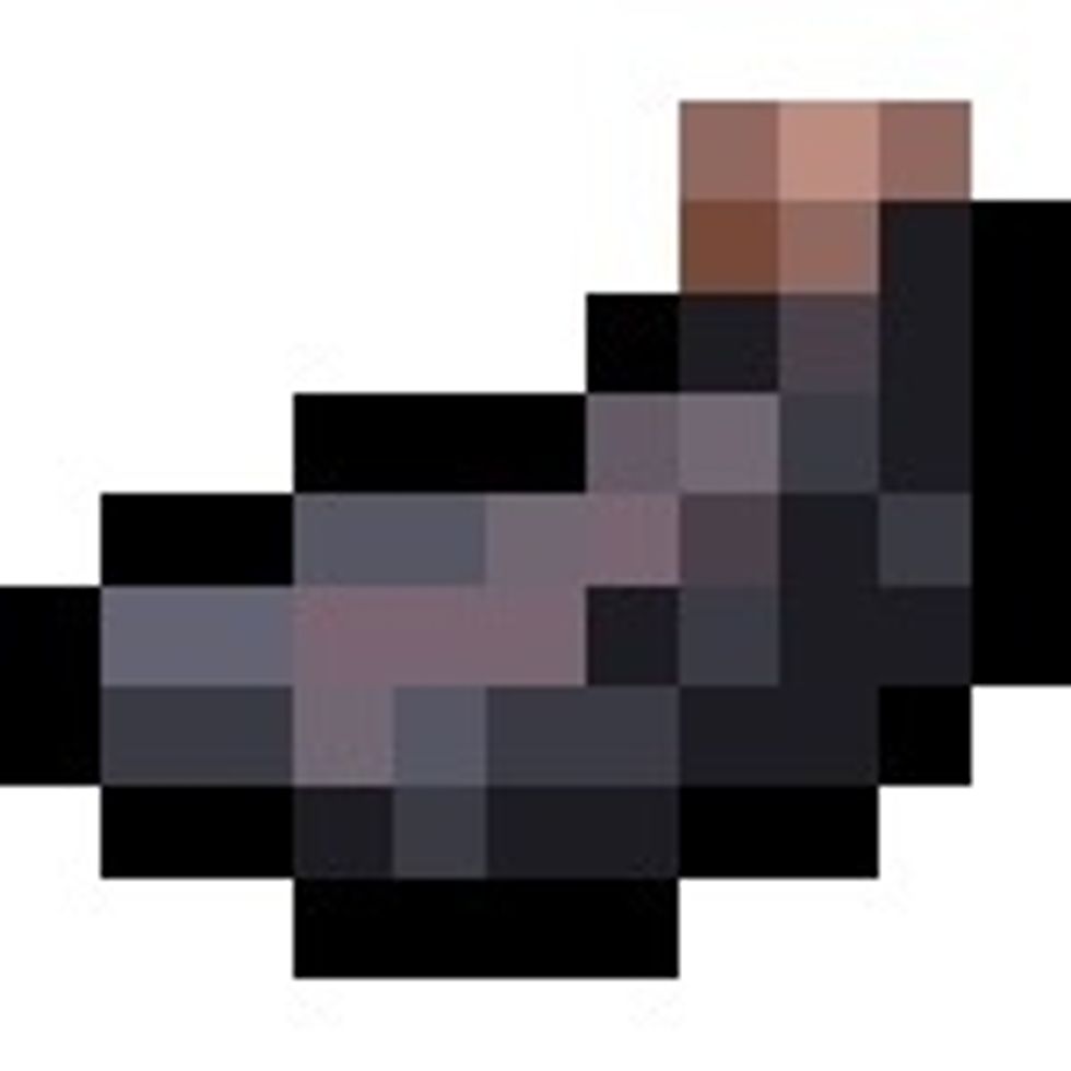 This is an inc sac, found by killing a squid. It can be crafted with white wool to make black wool.