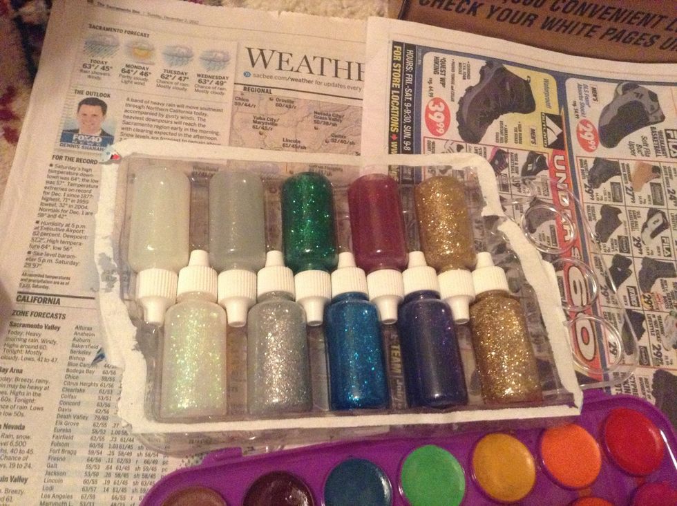 This is an old glitter glue set which I decided to use. It has silver, green, blue, red, purple, gold and 'clear' or opalescent. I will be using all, but you can choose whichever colors you want.