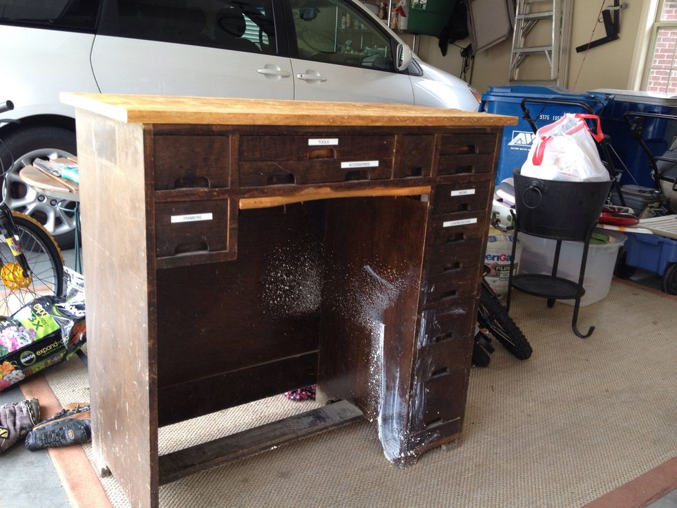 This is an old jewelers bench. It's been in a garage, used as a workbench for years, with paint splattered all over it. It can't be stained, so I'm painting it.