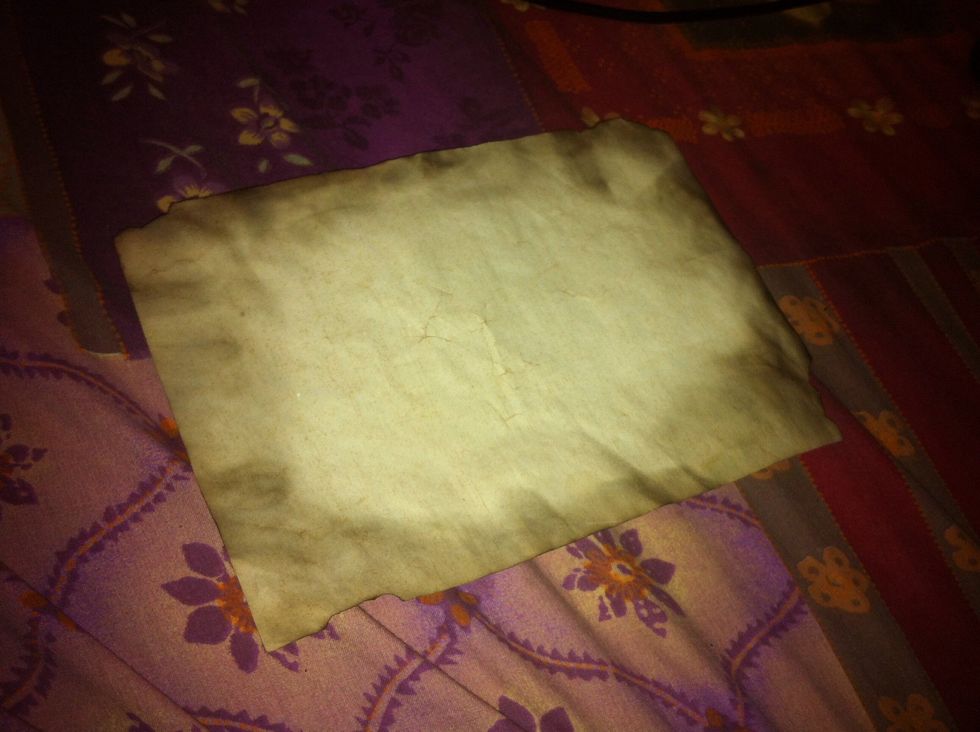 this is another antique paper and I smokes it from edges to give smoky antique paper look