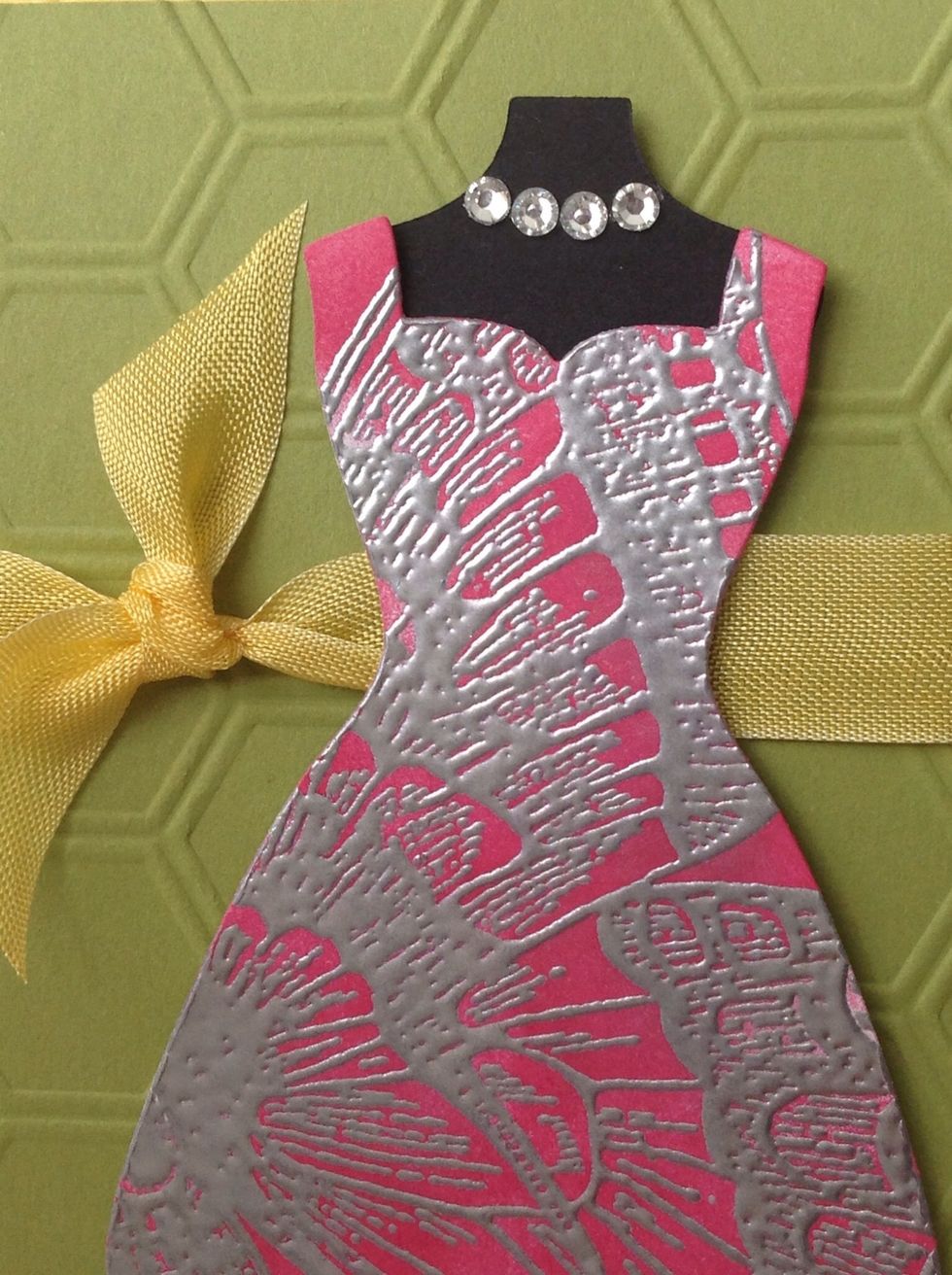 This is another example of the technique -- in this case the embossed butterfly was cut out using a Framelit