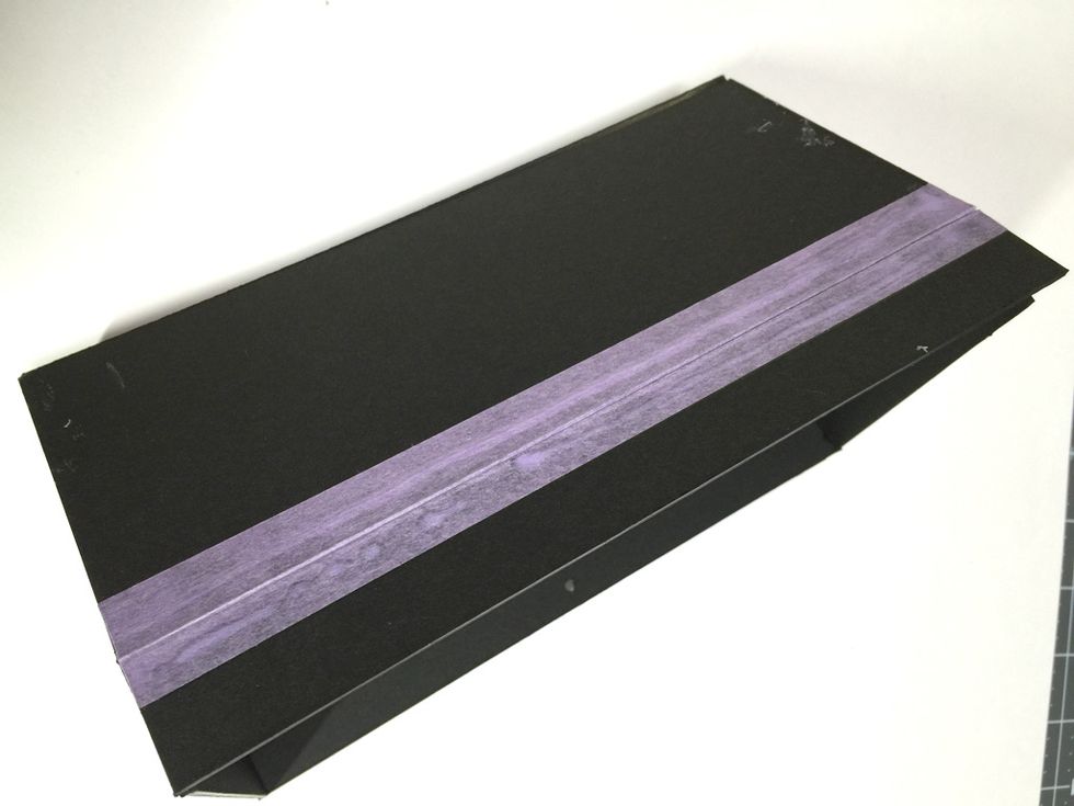 This is back side of roof panel adhere with masking tape you make a 1/8' Clearance so this part become hinge When you open this lunch house this part is bending