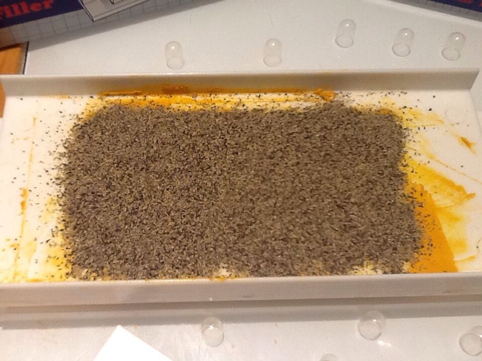 This is black pepper, added in the tampered holes to make the turmeric bioavailable.