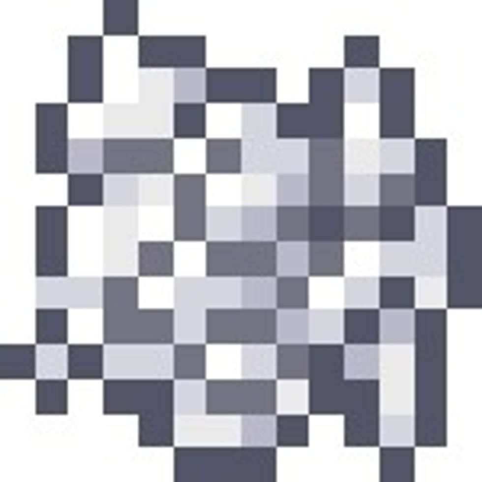 This is Bone Meal. It is crafted by using 1 bone. This can speed up the growth of flowers, trees and sugar cane.