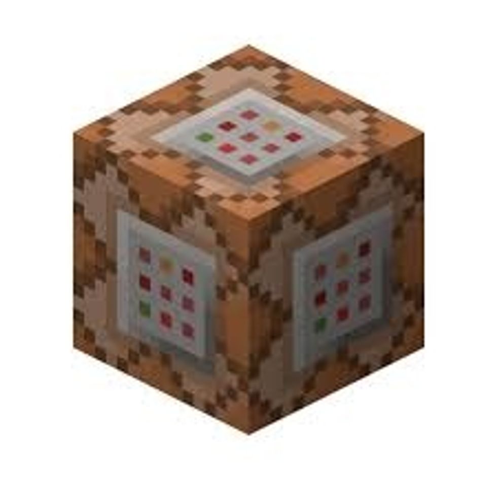this is command block. this block is little special, and it can never be found naturally and cant craft it. command block can activated with redstone, just like pistons.