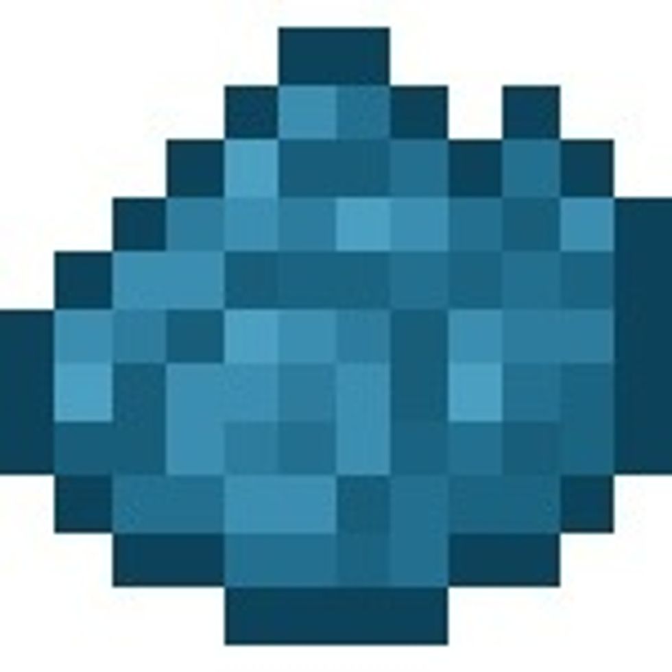 This is Cyan Dye and is made by Green Dye and Lapis Lazuli. Can be made into a Cyan wool block.