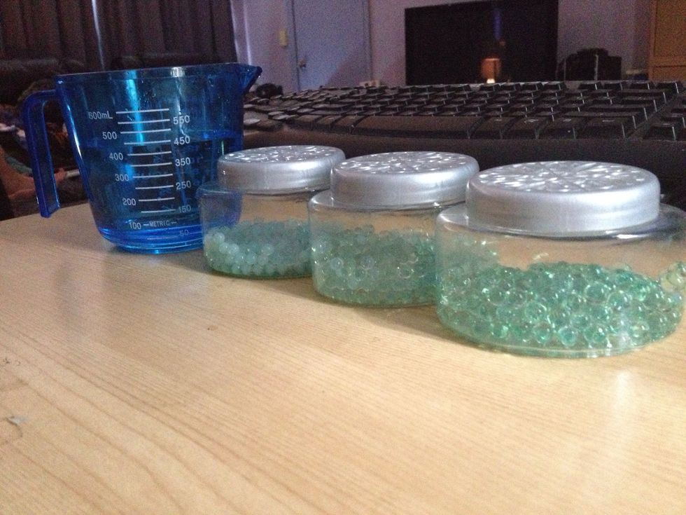 This is enough water to replenish all 3 containers. They were all opened at the same time, however placed in different rooms of the house. The smallest balls are from the hottest room (kitchen).