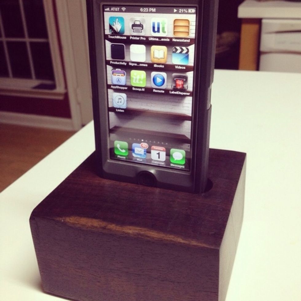 This is for my desk at school for iPhone 5, I built a speaker plug and lightning connecter so it will charge and play music thru my computer speakers. Made out of some rare wood I can't pronounce.