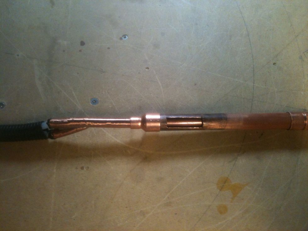 This is how all the pieces fit together. Air coming in on the left goes through the 3/8" pipe past the hole in the 1/2" pipe, creating a suction through the hole(which will be in the canister).