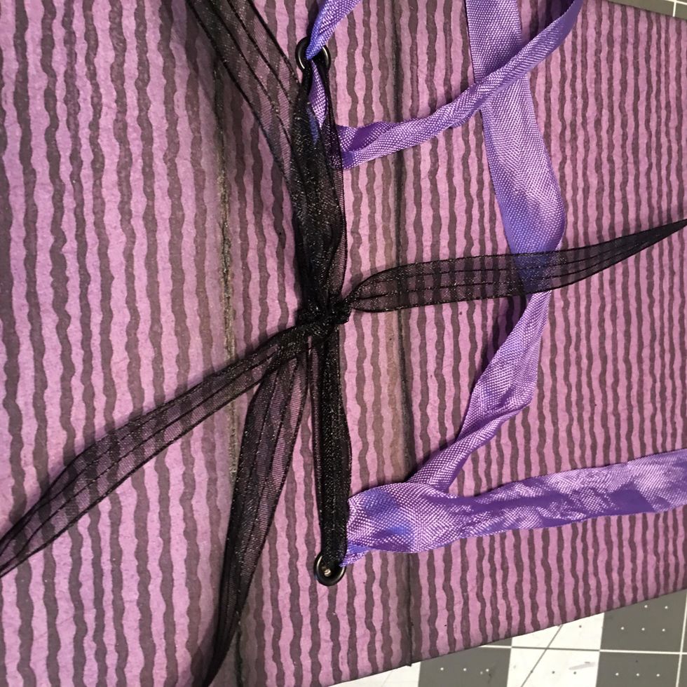 This is how it looks on the outside so far with the three ribbons of the three signature sets.