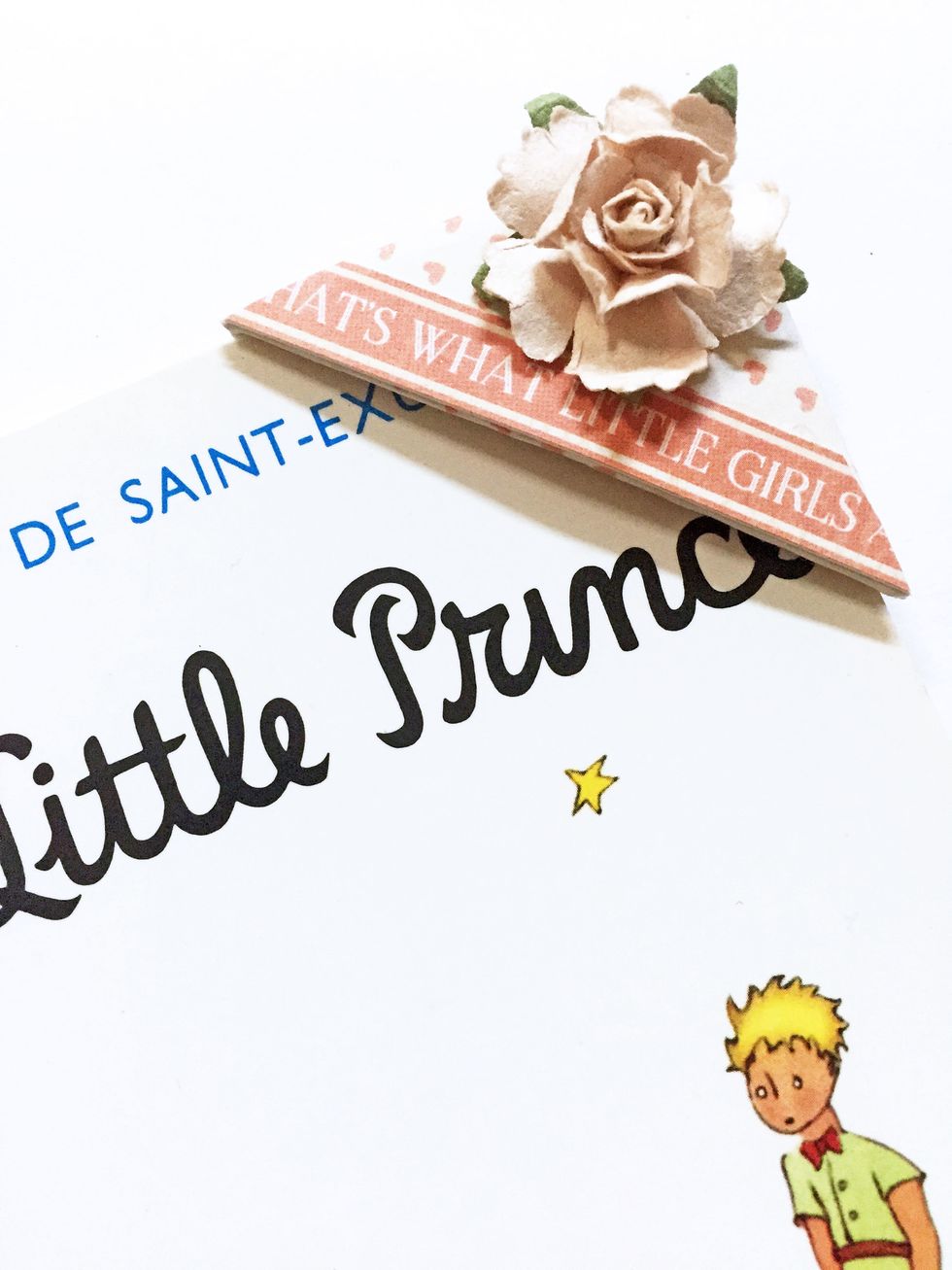 This is how it will fit into the corner of a book, which you can use it to fit into any other pages within a book as a bookmark. Enjoy!