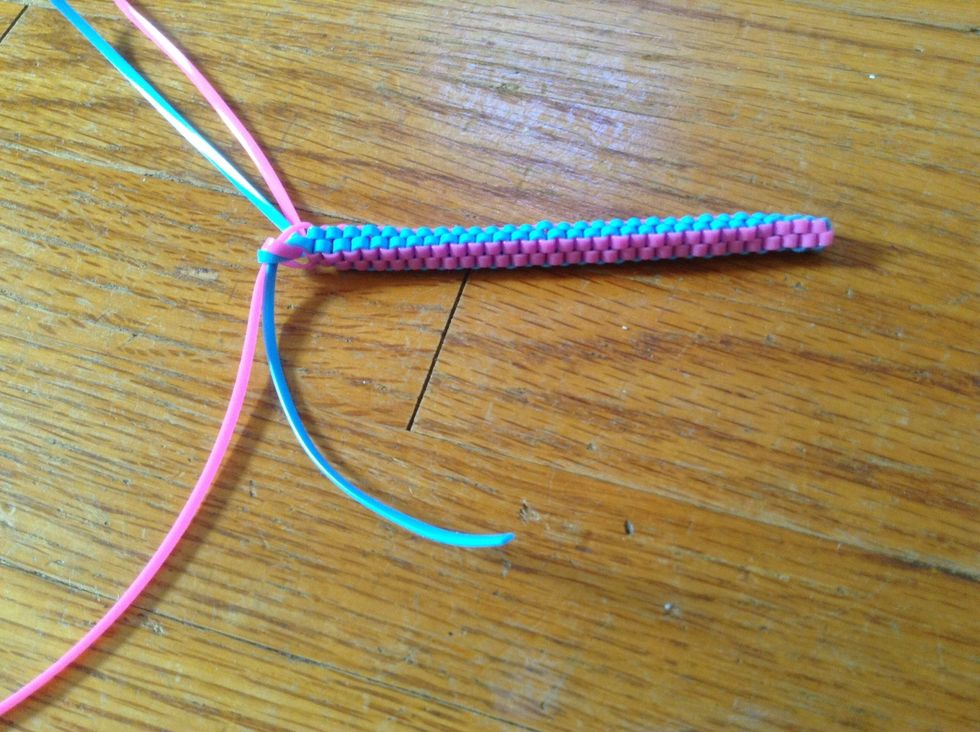 This is how long I wanted mine. When you are done, make sure there is enough string to tie a knot at the end.