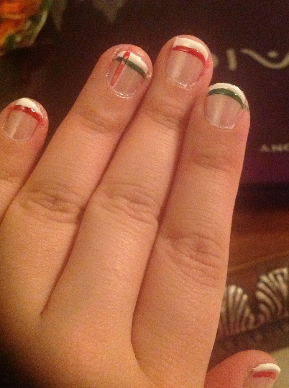 This is how my nails looked after painting. I added an extra line on my ring finger for fun. :)