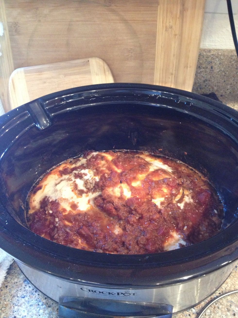 This is how the chicken looks at the moment. It's been in the crockpot for three hours so far.