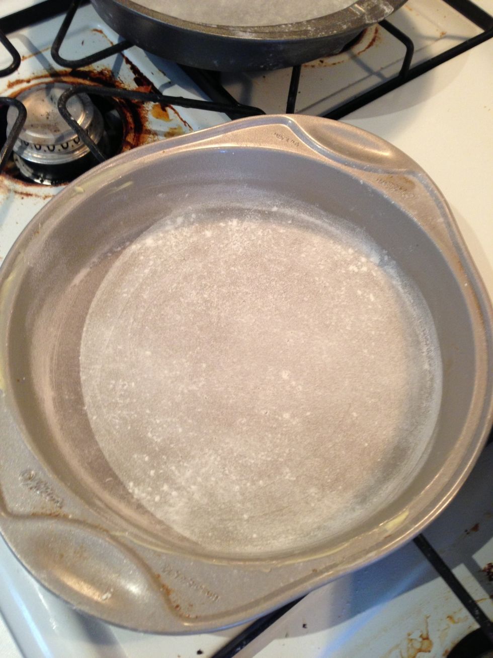 This is how the pan should look after you sprinkle and spread the coat of flour on the pan.
