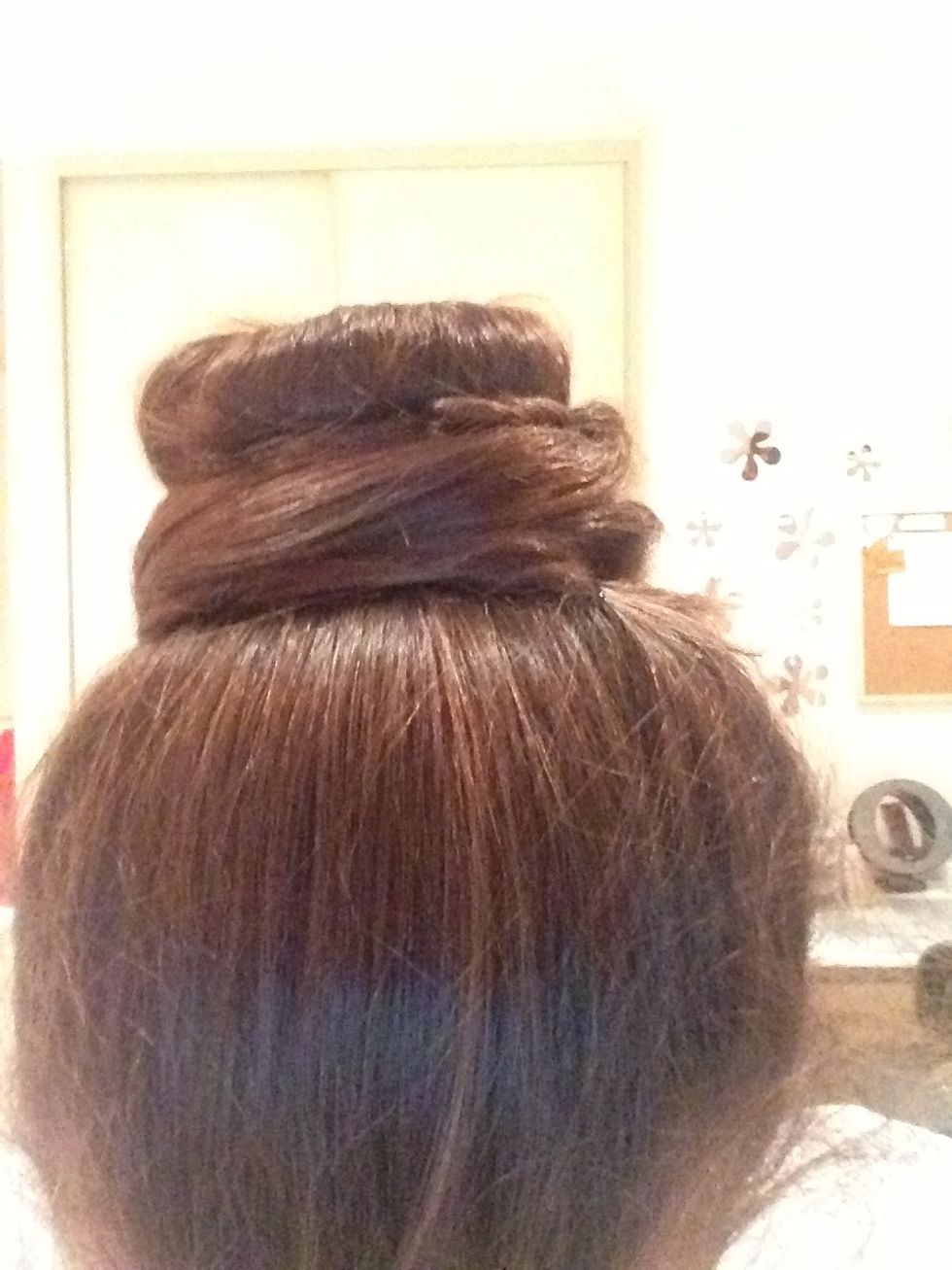 This is how the un-plaited bun looks like. Remember to secure with bobby pin!