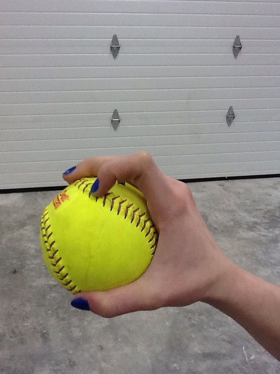 This is how you grip a rise ball. You really want to dig your pointer finger into the seam. For this grip, your finger tips should rest on the arch of the horseshoe.